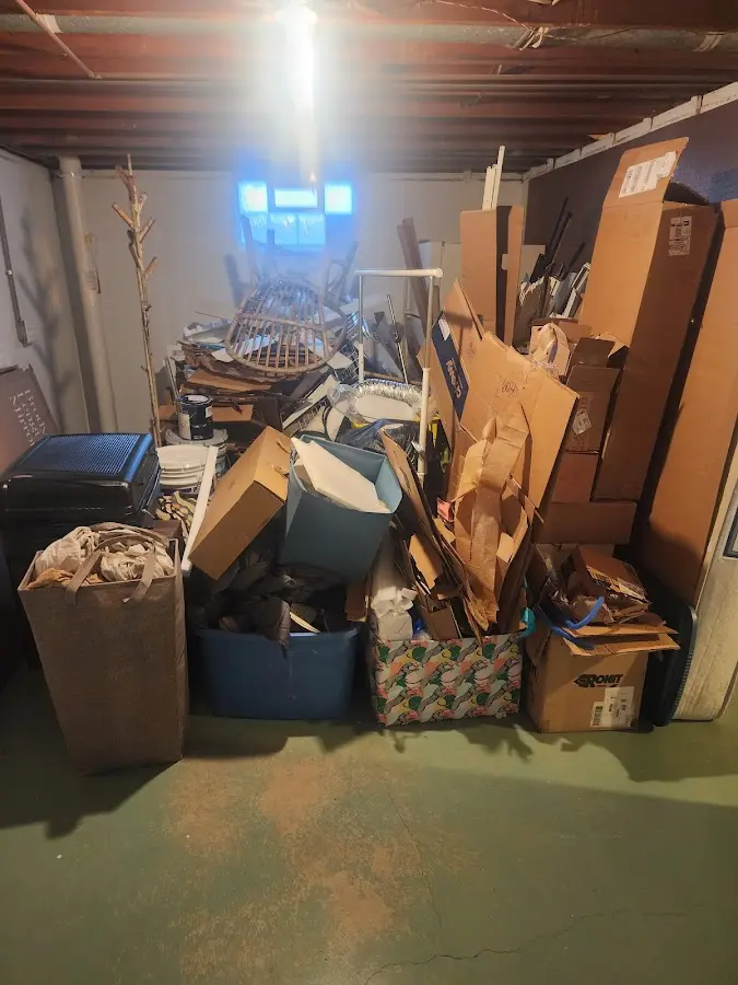 Roll-off dumpster container at job site for 6 Yard Dumpster Rental in Gantt